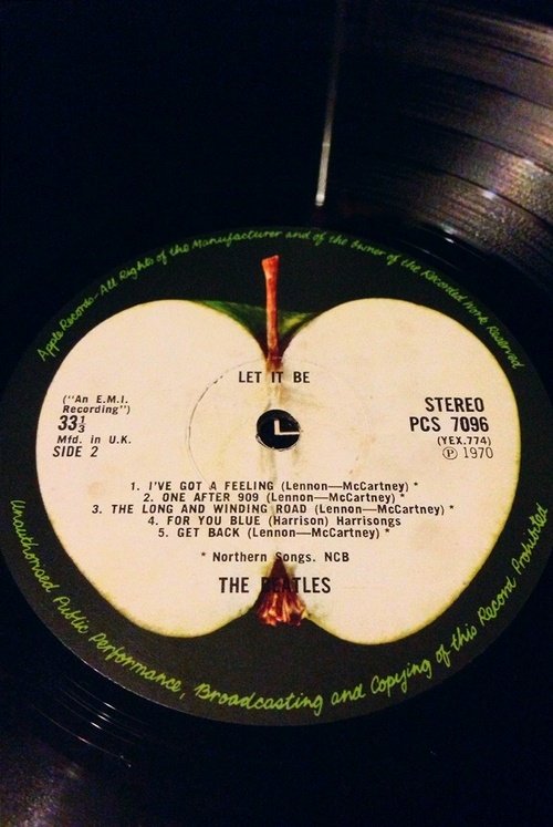 甲壳虫乐队（The Beatles）那个苹果公司出的黑胶唱片